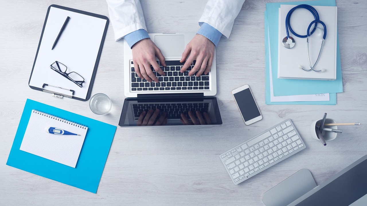 person typing laptop office desk (computer, business, typing, keyboard, laptop, doctor, medica)